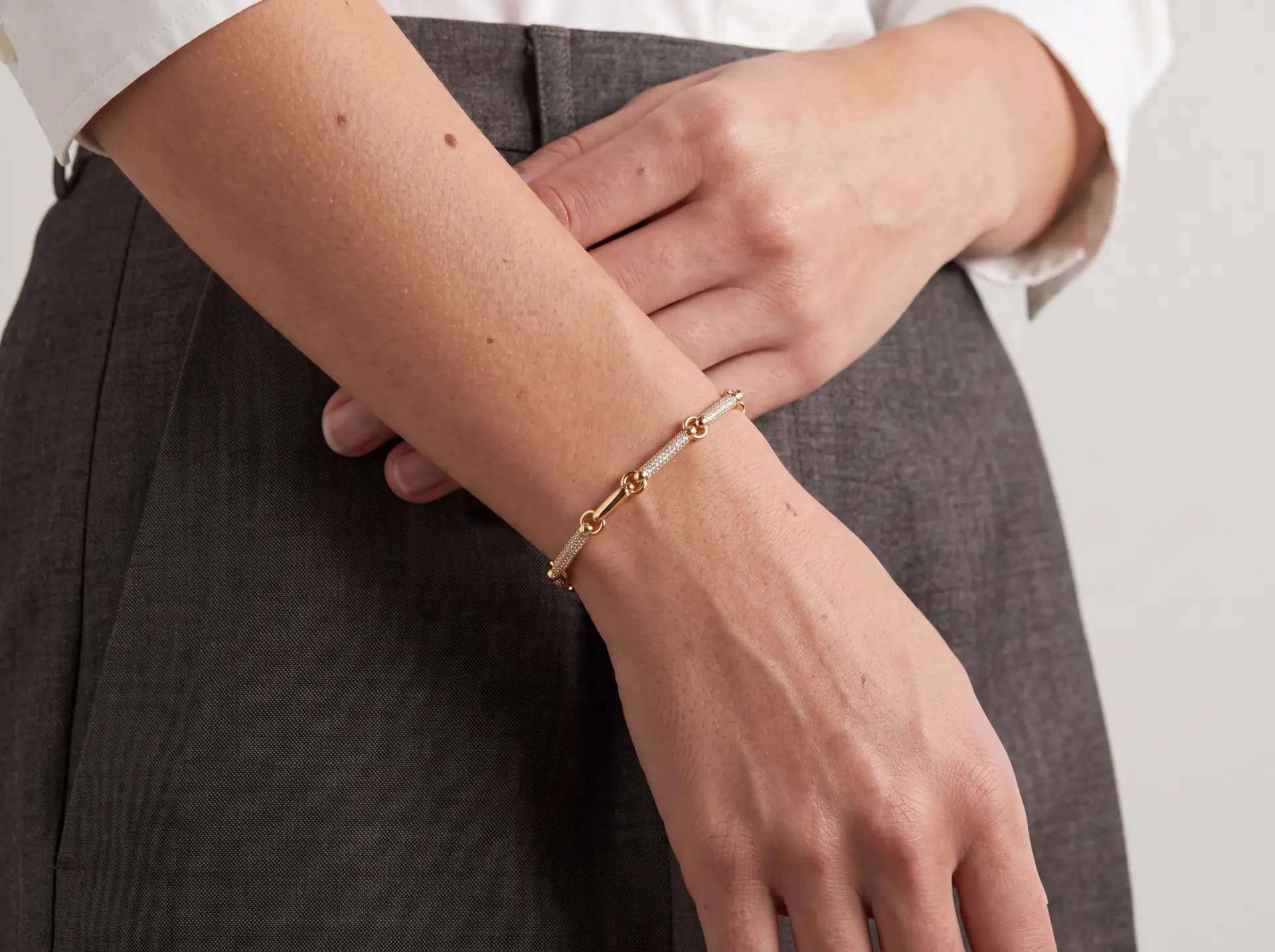 Slim pavé bar bracelet worn on the wrist